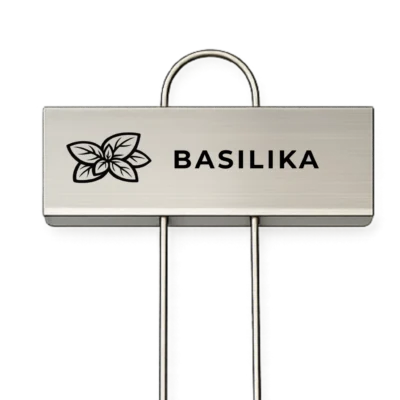 Rostfri växtskylt med texten Basilika och en graverad basilikaillustration